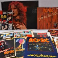 Box lot assorted ACDC books, vinyl LP records and ephemera incl Fly on The Wall and The Black albums, Countdown, Juke and other magazines, etc - Sold for $62 - 2019