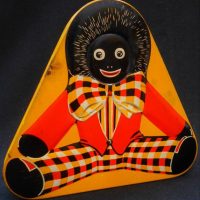 1930s yellow Pascal's 'Golly' triangular shaped confectionery  tin - Sold for $149 - 2019