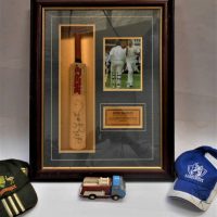 Group lot signed sporting merchandise incl presentation framed Glen Mc Grath miniature bat, North Melbourne cap, etc plus vintage Tonka truck - Sold for $31 - 2019