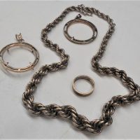 Group of Sterling silver including twist link German fob chain - Sold for $50 - 2019