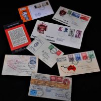 Small group lot vintage stamps incl Papua New Guinea and Australian first day covers, Tonga 'Tin Can Mail', etc - Sold for $50 - 2019