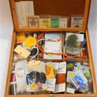 Wooden box of Fly fishing fly tying materials including feathers, hooks cotton, beads etc - Sold for $56 - 2019