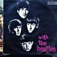 3 x The Beatles LP vinyl records, albums incl With The Beatles, Sgt Peppers (Red Vinyl and lift out), and The Essentials - Sold for $99 - 2019