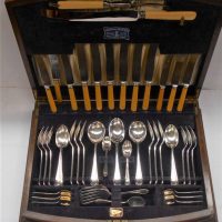 Canteen of Silver-plate Walker and Hall cutlery with bone handled knives - Sold for $75 - 2019