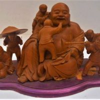 Carved Boxwood seated Buddha with 6 boy attendants - Sold for $43 - 2019