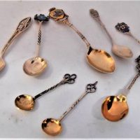 Group of Sterling silver and enamelled souvenir spoons and Pair of Australian sterling silver salt spoons by Sargisons Hobart - Sold for $35 - 2019