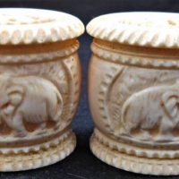 Pair of Vintage Ivory salt and pepper shakers with carved elephants - Sold for $81 - 2019