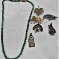 Small box lot mainly silver jewellery - Marcasite dress clip, pendants, 3 x brooches, fine Malachite bead necklaces etc - Sold for $50 - 2019