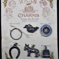 Vintage Carded STERLING SILVER XMAS Pudding Charms - Duck, Donkey, Button, etc - all still tied to card backing - Sold for $62 - 2019