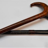 2 x Vintage walking canes  - Ebonised wood  with reptile skin band and fiddle back stick - Sold for $37 - 2019