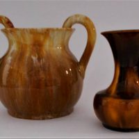 2 x pieces c1930s Australian pottery incl John Campbell twin handled vase and McHugh bud vase (af - nibble to rim) - both browncream glaze - Sold for $75 - 2019