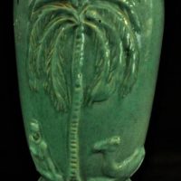 Large vintage Australian pottery green glazed vase with raised decoration 'Palm Tree with Camel'- unsigned - 33cm tall - Sold for $81 - 2019