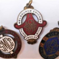 3 x 1920s enamelled cricket club badges South Melbourne and Richmond - Sold for $56 - 2019