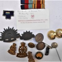 Group of wW1 Military Badges including Army Apprentices school, Rising sun Hat badge (kings crown), Regimental colour patches, silver dog tags etc - Sold for $62 - 2019