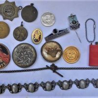 Small box - badges, Costume jewellery , medallions, 1945 Victory Medal,  Saints, Ronson cufflinks, Lourded box, red plastic keychain match striker etc - Sold for $56 - 2019