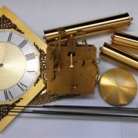 Suitcase with modern German long case clock movement, including chimes, pendulum and chains, face etc - Sold for $118 - 2019