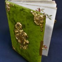 c1880 photo album, some floral pages, green velour padded cover and gilt embellishments - Sold for $43 - 2019