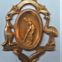 c1920 Australian 9ct Gold Cricket fob with  Kangaroo and emu flanking cricketer for the Comissioners cup won By Jolimont cricket clun - Sold for $186 - 2019