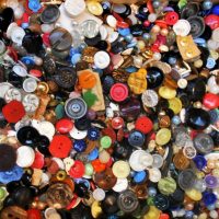 Tray of vintage buttons including plastic, Bakelite and glass etc - Sold for $43 - 2019