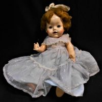1950's Pedigree hard plastic doll with original dress - flirty eyes, Mamma box,  open mouth with teeth showing, approx 52cm H - Sold for $75 - 2019