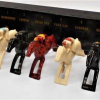 Australian made by LM Plastics Melbourne, Bakelite Raceplay horseracing game with named horses- Phar Lap, Windbag, Flight, Ajax, Shannon, Peter Pan, C - Sold for $75 - 2019