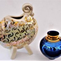 2 x Australian Pottery lustre vases inc, a contemporary Andrew Gibson blue one with gilt banding, approx 9cm H and a moon shaped form on two feet with - Sold for $43 - 2019