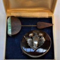 2 x pces Jewellery - vintage round Scottish brownclear agate Brooch with silver thistle to centre & 1920s Bakelite and green stone hatpin - Sold for $75 - 2019