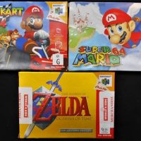 3 x Nintendo 64 games in original boxes including The legend of Zelda, Super Mario 64 & Mario Kart 64 - Sold for $137 - 2019