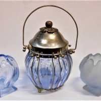 3 x vintage blue glass items inc, musical biscuit barrel with metal frame and lid and 2 x round squat vases - one frosted - Sold for $35 - 2019