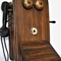 Vintage wall mounted telephone with wooden case, crank handle and Bakelite handset - Sold for $99 - 2019