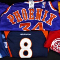 Group lot - Vintage & Modern mens SPORTS APPAREL - Heaps American Jerseys - Detroit Redwings, Phoenix Suns, Tennessee Titans, Denver Broncos, Cougars  - Sold for $37 - 2019