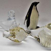 Small Group Lot Mid Century Modern Art glass figurines inc clear black and white cased penguin, seal with white details, bird and small rabbit - Sold for $35 - 2019
