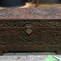 Vintage c194050's CAMPHOR Wood Chest - Heavily Carved w Characters, Symbols, Figures, etc + brass Corners, etc - Sold for $106 - 2019