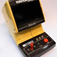 c1980's NINTENDO 'Donkey Kong Jr' Game & Watch table top arcade game with battery cover - Sold for $87 - 2019