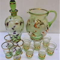 2 x Vintage 1950's Green Glass Drink sets - Decanter & 4 Glasses + Jug & 6 Glasses - hGilded & floral detail - Sold for $37 - 2019