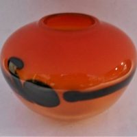 Australian Art Glass Pauline Delaney squat vase - clear and orange with black swirl,  incised signature to base, approx 8cm H - Sold for $43 - 2019