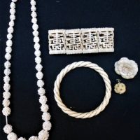 Small group lot carved bone jewellery incl bangle, brooch, necklace, etc - Sold for $56 - 2019