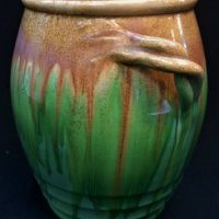 c1930's Australian Pottery - Remued '64-8H' handled vase - cream to green glaze - approx 20cm tall - incised to base - Sold for $99 - 2019