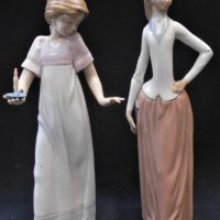 2 x Lladro Nao porcelain figurines  inc, Elegant Lady and a Girl with a candle af finger) - both approx 28cm H - Sold for $56 - 2019