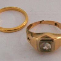 2 x gold rings - small 18ct ygold band (2grm) & clear square stone in rubbed in setting (band af) - Sold for $130 - 2019