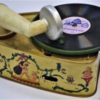 1920s German Bing tinplate toy - Bingola 1 gramophone record player, cream body lithographed with cherubs at play, with turntable, sound box and recor - Sold for $87 - 2019