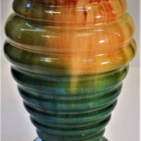 Australian Pottery -1930's  Bennett's of Adelaide ribbed vase, green and tan glaze, approx 22cm H, (af) - Sold for $50 - 2019