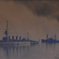 Framed vintage photograph - HMAS Adelaide and coal tender 'Billoela' at Hervey Bay Queensland - 14cm x 205cm - Sold for $31 - 2019
