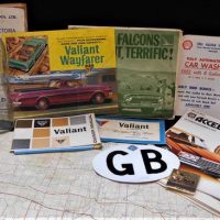 Group lot vintage motoring ephemera incl Valiant Wayfarer sales brochure and manual, Falcon jigsaw, GB - RAV grill plate, etc plus vintage Laurel kero - Sold for $87 - 2019