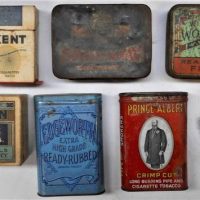 Small box lot vintage tobacciana incl Kent transistor radio, Wild Woodbine, Edgeworth and other tobacco tins, pistol shaped lighter, etc - Sold for $68 - 2019