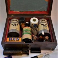 Victorian rosewood hinged box with contents of first aid incl Boracic Acid, Bex, DeWitts, Penetrene, etc - Sold for $43 - 2019