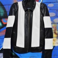 Vintage VFL Collingwood Football Club black and white striped leather jacket with magpie logo on back - Sold for $56 - 2019