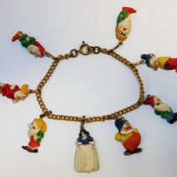 1940s Snow White & The Seven Dwarfs plastic charm Bracelet - Sold for $75 - 2019