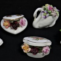 4 x Royal Albert, Adderley porcelain floral arrangements, boots, swan, wheelbarrow, trinket boxes - Sold for $35 - 2019