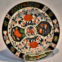 Circa 1877 - 1889 English Royal Crown Derby china plate - Imari colours with Hpainted floral and birds, gilt rim and highlights, approx 23cm D - Sold for $37 - 2019